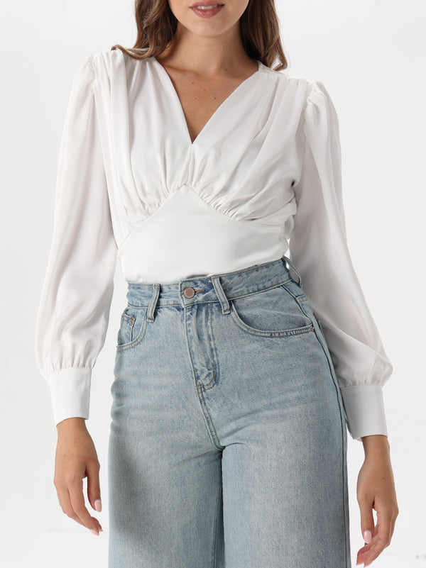 Silk blouse with ruffled shoulder and V neck