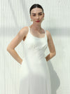White dress with sleeveless design and hidden pockets