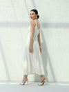 White dress with sleeveless design and hidden pockets