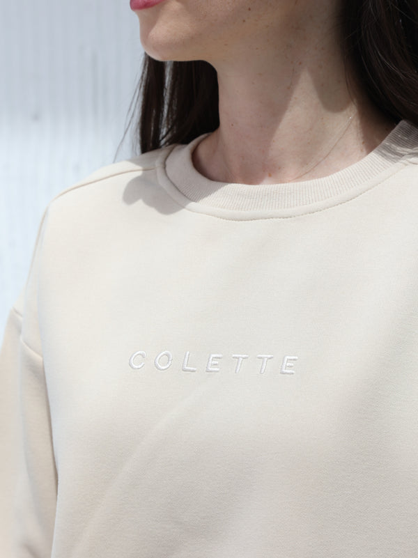 A winter free size T-shirt with embroidered writing in Beige