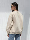A winter free size T-shirt with embroidered writing in Beige