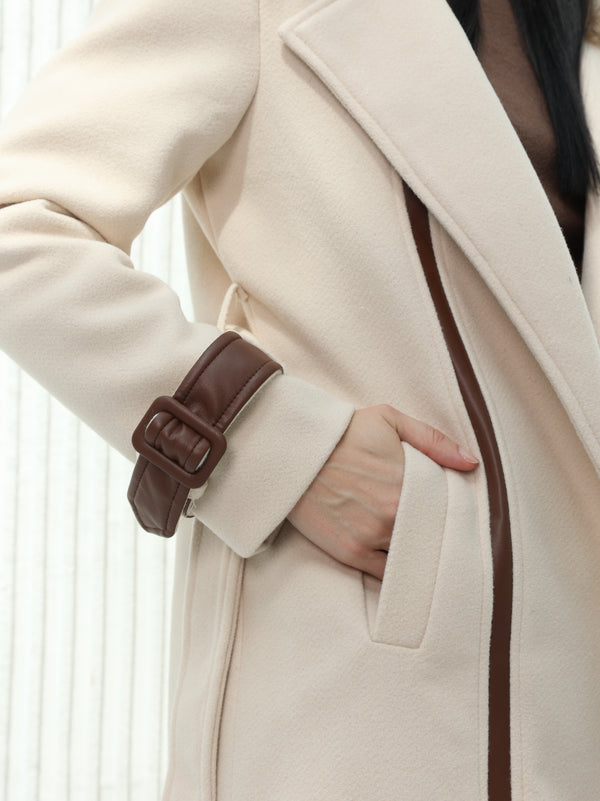 Long beige wool coat with leather details