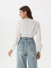 Silk blouse with ruffled shoulder and V neck