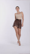 Short leather skirt with a tie in the front