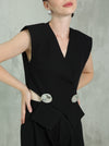 Elegant black two-piece set with a silver brooch