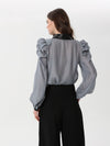 Organza blouse with leather collar, cuffs and ruffles at the shoulder