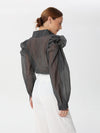 Organza blouse with ruffles at the shoulder