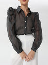 Organza blouse with ruffles at the shoulder