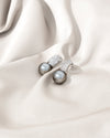 Pearl and rhinestone earrings