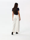 Wide-leg jeans with belt and pleats