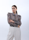 Organza blouse with ruffles at the shoulder