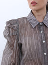 Organza blouse with ruffles at the shoulder