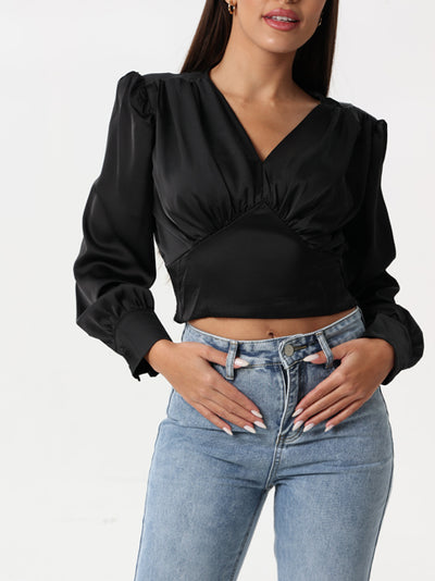 Silk blouse with ruffled shoulder and V neck