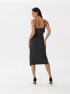 Midi dress with ruffles at the waist, a thigh slit, and half straps with metal decoration