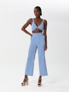 Two-piece set in solid color linen and a cropped blouse