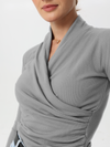 T-shirt with a V-neckline and side ruffles