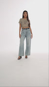 Wide-leg jeans with belt and pleats