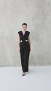 Elegant black two-piece set with a silver brooch